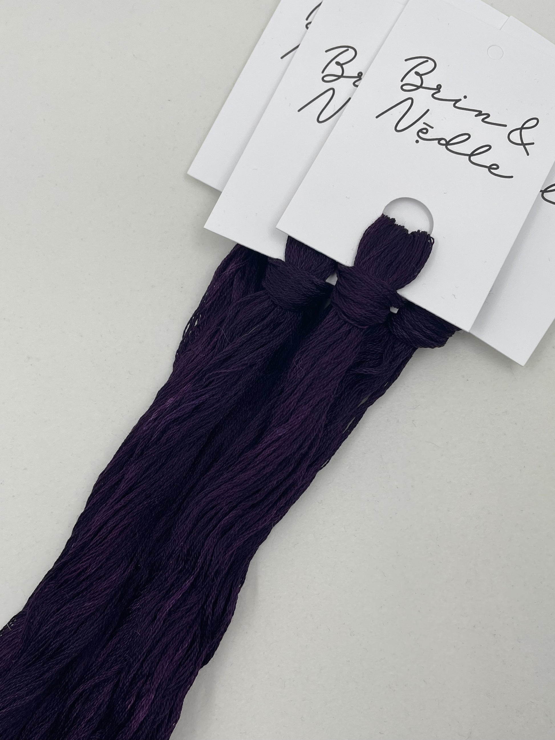 Six strand cotton floss in a deep rich plum