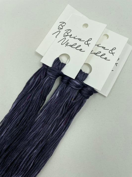 Six strand cotton floss this is a dark charcoal-mauve with slight hits of plum
