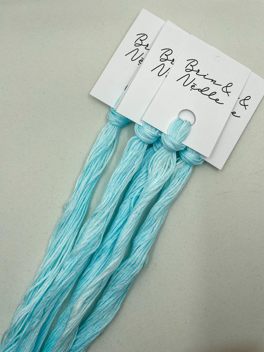 Six strand cotton floss with crisp icy blues - just like the tip of an iceberg